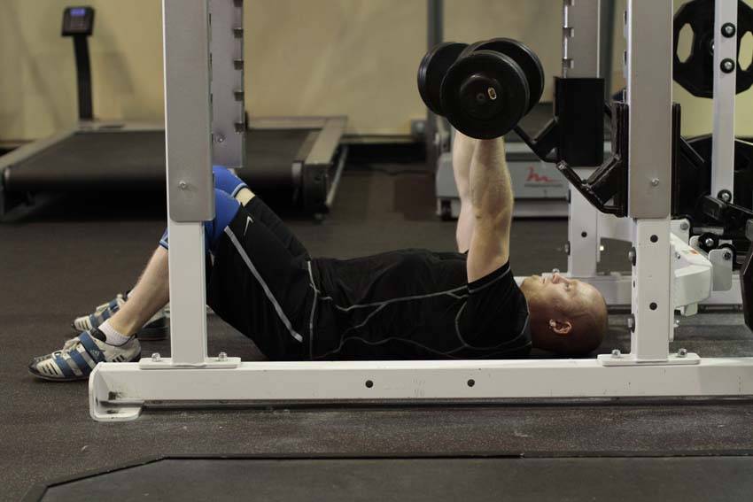 Dumbbell Floor Press — start position